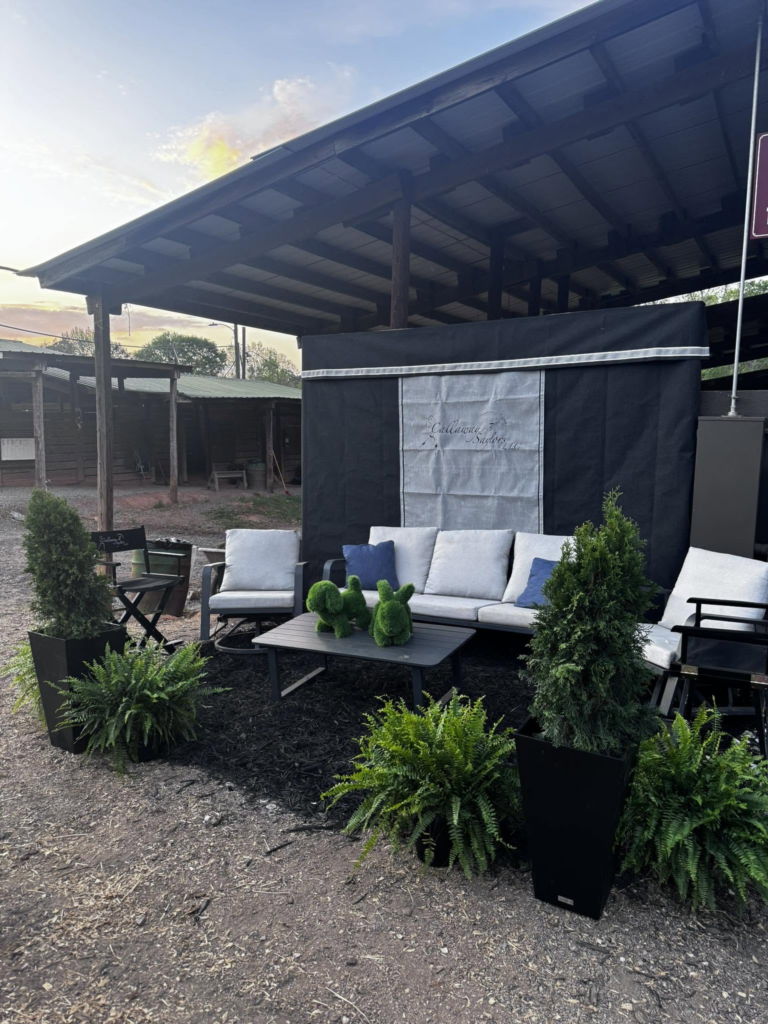 Callaway Saylors show stabling lounge with branded drapes and seating